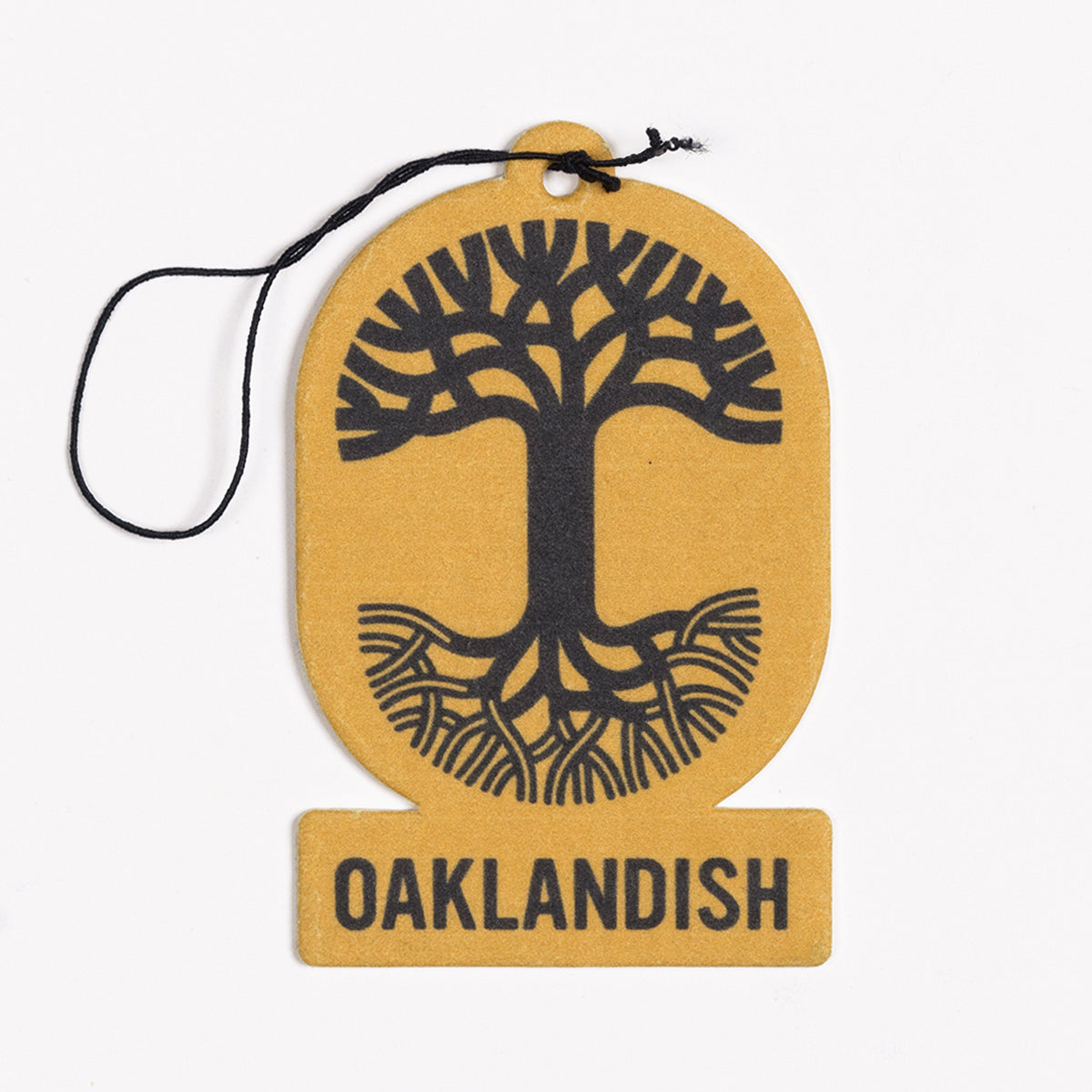 Introducing the Oaklandish Air Freshener by Oaklandish: a circular air freshener showcasing a black stylized tree with roots spreading outwards on a brown background. Below the tree, "OAKLANDISH" is elegantly printed in black letters. This stylish accessory includes a black string at the top for convenient hanging, bringing delightful scents to your space.