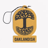 Yellow felt air freshener with the Oaklandish tree logo and wordmark.