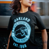 Female model wearing Black Panther Power t-shirt.
