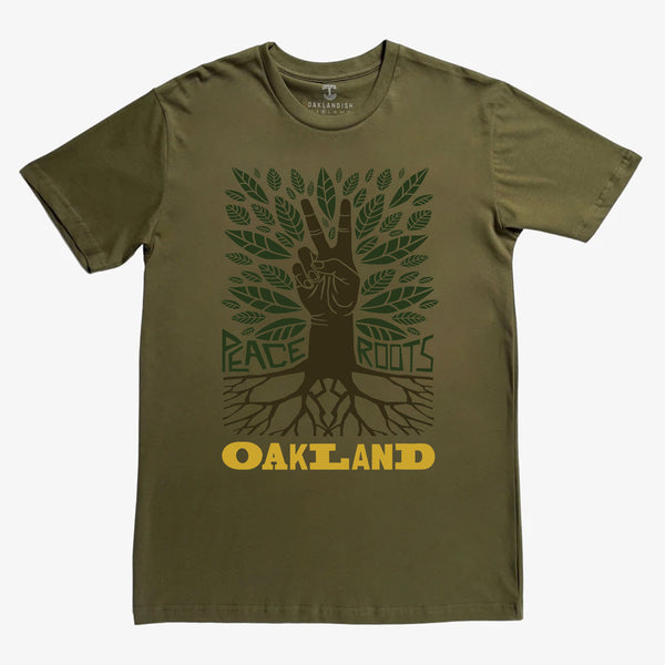 Army green t-shirt depicting an oak tree with green leaves with a brown hand for a trunk and words Peace, Roots, Oakland.