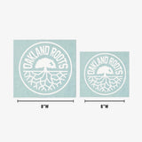 Graphic depicting the two sizes of white Oakland Roots circular logo car window stickers that are 8” wide and 6” wide.