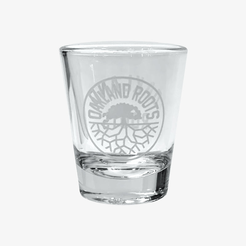 Liquor shot glass (1.75 oz) with translucent white Oakland Roots logo crest.