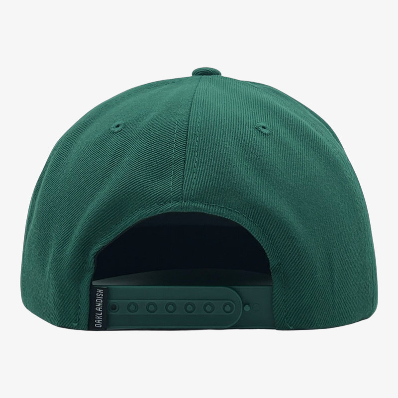 Back of forest green cap with green plastic snap back closure.