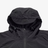 Close up of hood on a black lightweight zip up jacket. 