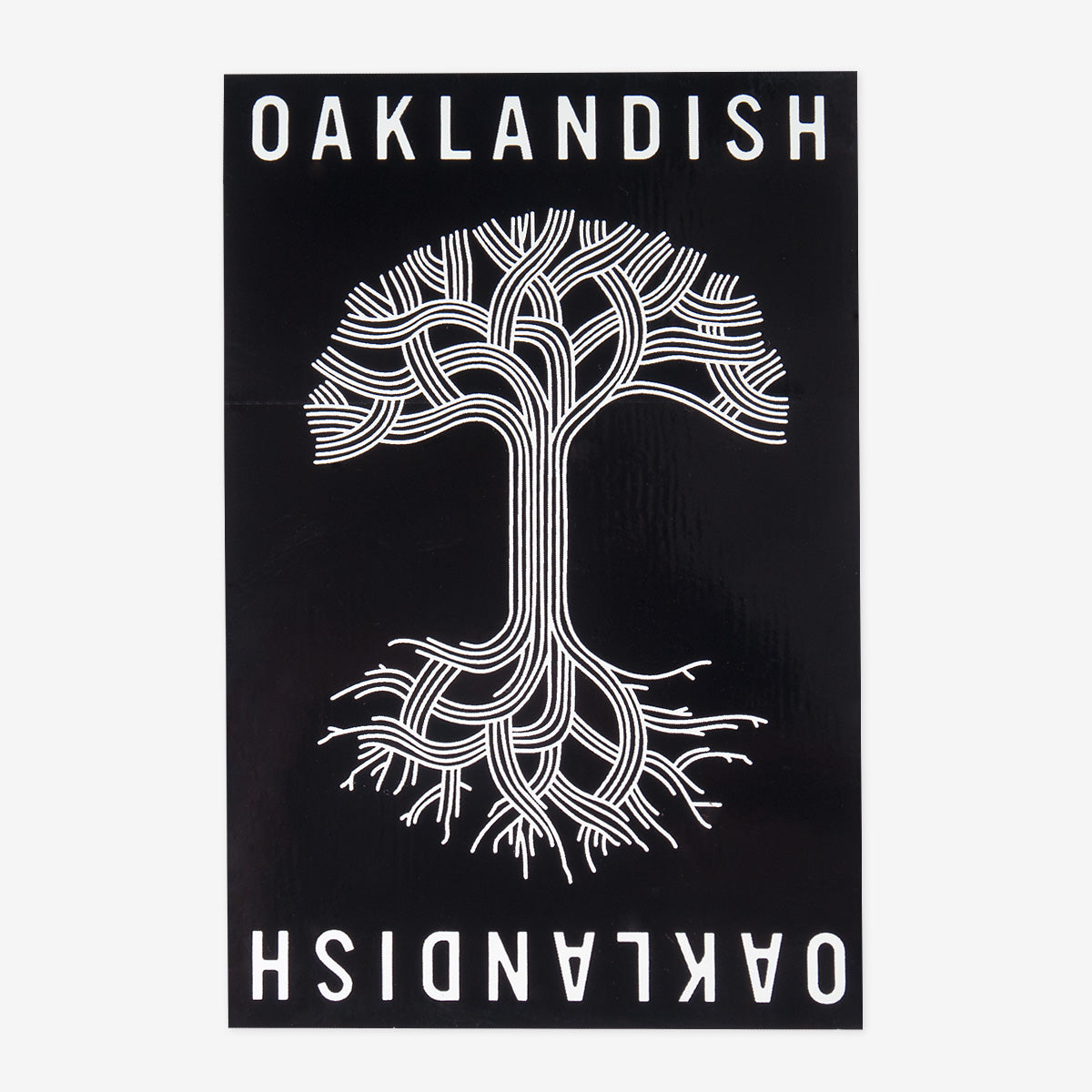 Black and white rectangular sticker with Oaklandish wordmark and tree logo in white.