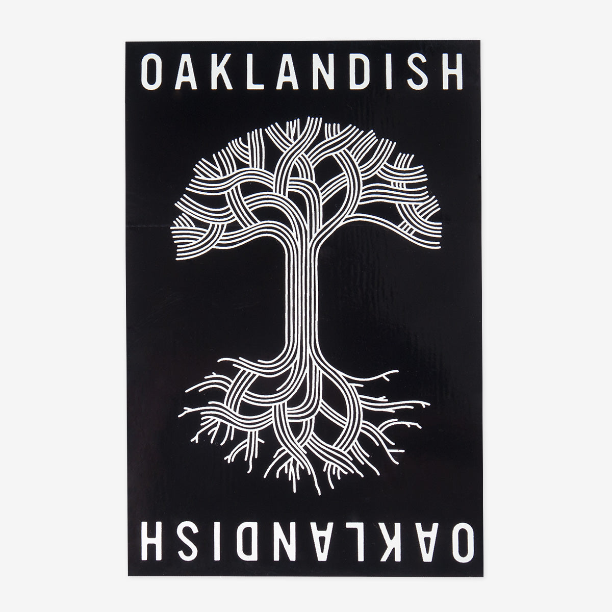 A black rectangular image featuring a white, intricate, abstract tree design with roots and branches forming complex patterns. The word "OAKLANDISH" appears at the top and bottom in bold white capital letters, with the bottom text mirrored upside down. Perfect as an Oaklandish Classic Sticker or accessory for any fan of Oakland.