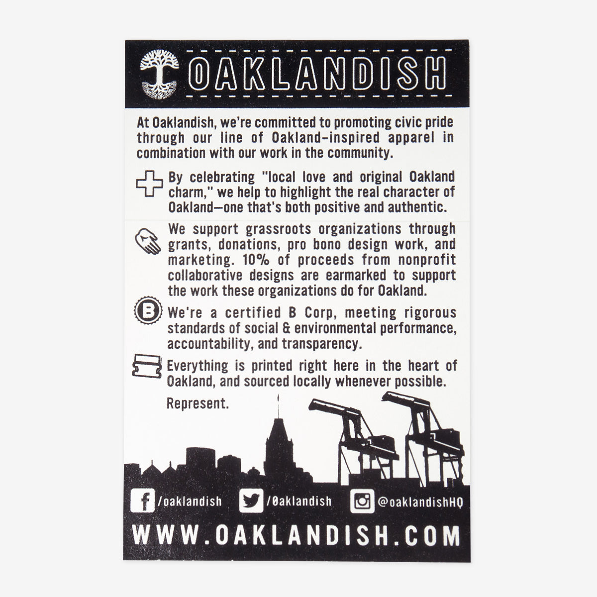 The back side of an Oaklandish sticker with the Oaklandish mission statement printed on it.