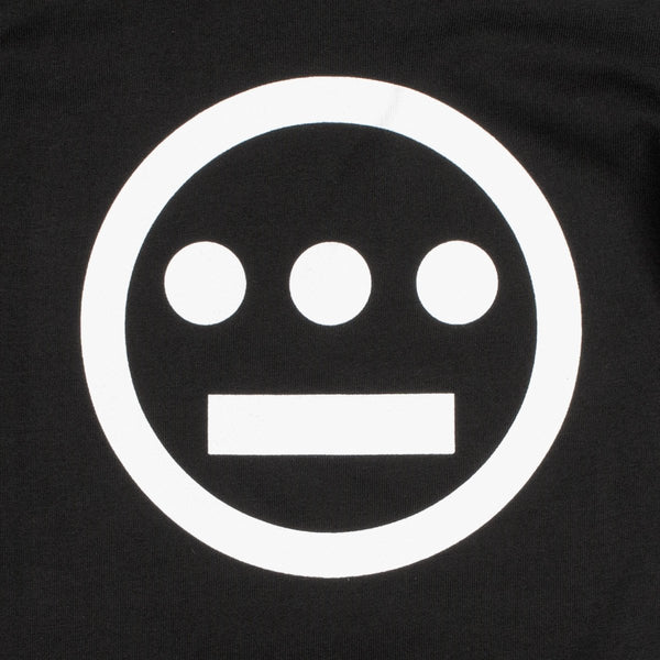 Close up of a white Hiero hip-hop crew logo on the chest of a black toddler t-shirt.