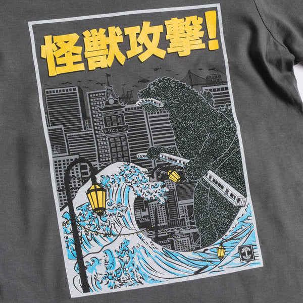 Close-up of graphic of Kaiju Monster attacking Oakland on a charcoal toddler sized t-shirt.