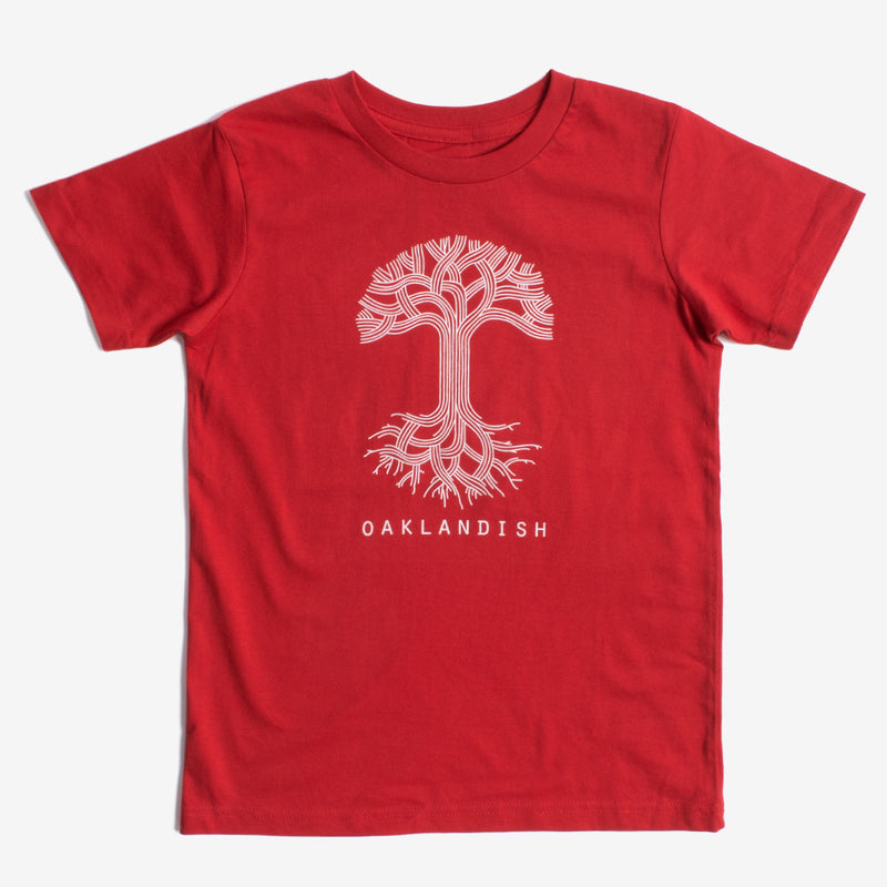 A youth sized red t-shirt with white classic Oaklandish tree logo and wordmark. 
